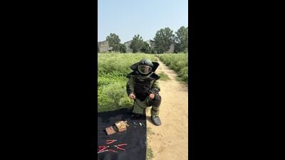 An Explosive Ordnance Disposal team defusing the IED recovered in Tarn Taran during a a search operation on Thursday. (HT) An Explosive Ordnance Disposal team defusing the IED recovered in Tarn Taran during a a search operation on Thursday. (HT)