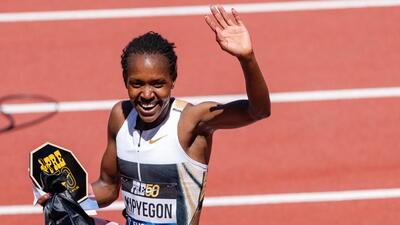 Faith Kipyegon of Kenya after winning the women's 1500m and setting a new world record at Hayward Field on July 5. (AFP) Faith Kipyegon of Kenya after winning the women's 1500m and setting a new world record at Hayward Field on July 5. (AFP)