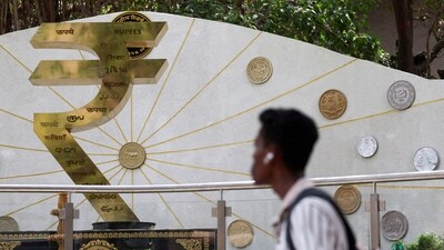 "The rupee's measured response to the new tariffs likely reflects the Reserve Bank of India's (RBI) resolve to prevent a breach of the all-time low of 87.95," says a trader. (Reuters)