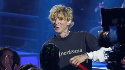 US rapper Machine Gun Kelly during a performance at the Nickelodeon Kids' Choice Awards. (Photo by VALERIE MACON / AFP) (AFP)