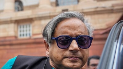 Congress MP Shashi Tharoor outside Parliament in New Delhi. (PTI) Congress MP Shashi Tharoor outside Parliament in New Delhi. (PTI)