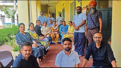 The staff of LR DAV College protesting over long-pending salaries in Jagraon on Thursday. (HT Photo)