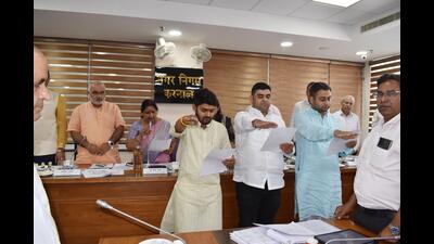 Three councillors, Umesh Procha, Gaurav Nagpal and Vishesh Verma were administered the oath by mayor Renu Bala Gupta in Karnal on Thursday. (HT Photo)