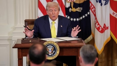 Donald Trump speaks about not using an autopen, after signing a proclamation officially declaring this National Purple Heart Day (REUTERS)