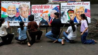 Students of Gurukul school of Art work on artwork of U.S. President Donald Trump and Prime Minister of India Narendra Modi, in Mumbai Students of Gurukul school of Art work on artwork of U.S. President Donald Trump and Prime Minister of India Narendra Modi, in Mumbai