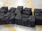 Bags containing the cocaine that was seized during an alleged attempt to smuggle them into the country by an Indo-Canadian trucker (CBSA) Bags containing the cocaine that was seized during an alleged attempt to smuggle them into the country by an Indo-Canadian trucker (CBSA)