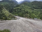 Mud and debris following flash floods in Dharali region of Uttarakhand's Uttarkashi on Thursday. (PTI) Mud and debris following flash floods in Dharali region of Uttarakhand's Uttarkashi on Thursday. (PTI)