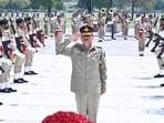 Field Marshal Asim Munir salutes after laying wreath on a martyrs' monument at the Pak army headquarters in Rawalpindi. 