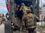 Security personnel on the Day 7 of anti-terrorist operation in Jammu and Kashmir's Kulgam district on Thursday. (PTI)