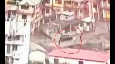 A video showing Furqan Ahmed speeding up his vehicle to escape the deluge has gone viral on social media. (Video grab) A video showing Furqan Ahmed speeding up his vehicle to escape the deluge has gone viral on social media. (Video grab)
