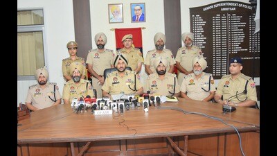 Amritsar commissioner of police Gurpreet Singh Bhullar addressing the media about the case. (HT)