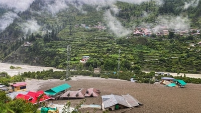 An area near Dharali stands waterlogged following the devastating flash floods that swept Uttarkashi on Tuesday. (PTI) An area near Dharali stands waterlogged following the devastating flash floods that swept Uttarkashi on Tuesday. (PTI)