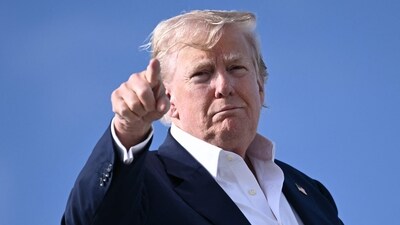 US President Donald Trump points as he boards Air Force One at RAF Lossiemouth, north-east Scotland. (AFP File) US President Donald Trump points as he boards Air Force One at RAF Lossiemouth, north-east Scotland. (AFP File)