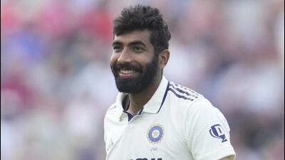 Jasprit Bumrah smiles as he celebrates the dismissal of England's Jamie Smith on the third day of fourth Test. (AP)