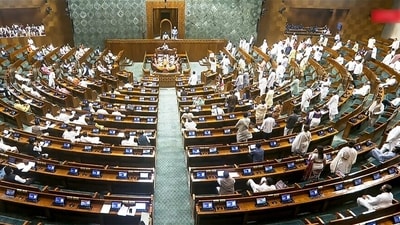 Opposition MPs create ruckus in Lok Sabha during the Monsoon Session of the Parliament, in New Delhi on Friday. (Sansad Tv) Opposition MPs create ruckus in Lok Sabha during the Monsoon Session of the Parliament, in New Delhi on Friday. (Sansad Tv)