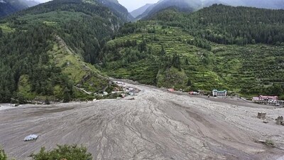 Mud and debris following flash floods in Dharali region of Uttarakhand's Uttarkashi on Thursday. (PTI) Mud and debris following flash floods in Dharali region of Uttarakhand's Uttarkashi on Thursday. (PTI)