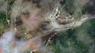 This satellite image taken on August 7, shows the same Dharali village engulfed in debris after the deadly floods swept the area on August 5. (Maxar Technologies via AP) This satellite image taken on August 7, shows the same Dharali village engulfed in debris after the deadly floods swept the area on August 5. (Maxar Technologies via AP)