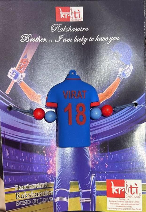 For die-hard cricket fans, jersey-themed rakhis inspired by none other than Virat Kohli are flying off the shelves.  Price:  ₹130