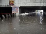 A motorist tries to wade through a flooded underpass near Jangpura Metro station on Saturday. (Arvind Yadav/HT Photo) A motorist tries to wade through a flooded underpass near Jangpura Metro station on Saturday. (Arvind Yadav/HT Photo)