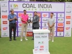 Angad Cheema (left) with Coal India Open 2025 winner’s trophy in Ahmedabad. (HT Photo) Angad Cheema (left) with Coal India Open 2025 winner’s trophy in Ahmedabad. (HT Photo)