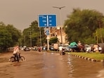 Commuters stuck in huge traffic jams after the sudden downpour on Friday. (Vidhya Narayanan/HT)