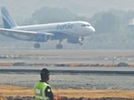 Navi Mumbai, India - Dec. 29, 2024:First commercial aircraft landing on the runway of Navi Mumbai International Airport Ltd at Ulwe in Navi Mumbai, India, on Sunday, December 29, 2024. (Photo by Bachchan Kumar/ HT PHOTO) (HT PHOTO)