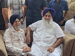 Shiromani Akali Dal (SAD) president Sukhbir Singh Badal with former Dirba MLA Baldev Singh Mann after he rejoined the party in Sangrur on Friday. (HT)