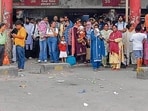 The stranded commuters at Ludhiana bus stand during the strike on Friday. (Manish/HT)