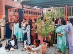 Women wait in a queue to meet their brothers lodged at the Central Jail in Ludhiana on Saturday. (HT Photo) Women wait in a queue to meet their brothers lodged at the Central Jail in Ludhiana on Saturday. (HT Photo)
