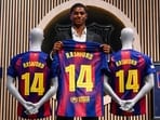 English forward Marcus Rashford who joined Barcelona on loan from Manchester United holds up his jersey English forward Marcus Rashford who joined Barcelona on loan from Manchester United holds up his jersey