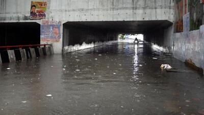 A motorist tries to wade through a flooded underpass near Jangpura Metro station on Saturday. (Arvind Yadav/HT Photo) A motorist tries to wade through a flooded underpass near Jangpura Metro station on Saturday. (Arvind Yadav/HT Photo)