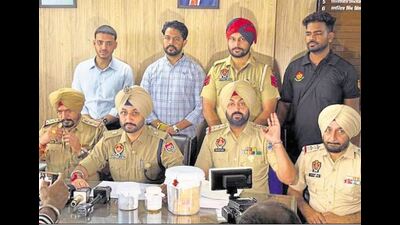 Cops briefing the media about arrests in Mohali on Saturday. (HT Photo) Cops briefing the media about arrests in Mohali on Saturday. (HT Photo)