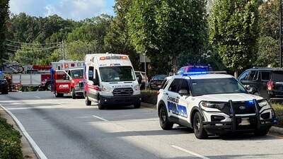 The suspect was found with gunshot wounds, but it was unclear if the bullets were from responding officers or self inflicted (AP) The suspect was found with gunshot wounds, but it was unclear if the bullets were from responding officers or self inflicted (AP)