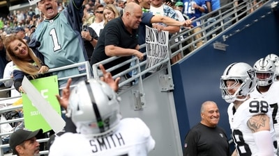 Geno Smith and Maxx Crosby of the Raiders faced backlash after flipping off Seahawks fans during a preseason game. (Photo by Steph Chambers / GETTY IMAGES NORTH AMERICA / Getty Images via AFP) (Getty Images via AFP) Geno Smith and Maxx Crosby of the Raiders faced backlash after flipping off Seahawks fans during a preseason game. (Photo by Steph Chambers / GETTY IMAGES NORTH AMERICA / Getty Images via AFP) (Getty Images via AFP)