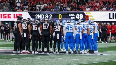 Atlanta Falcons and Detroit Lions players pray after an injury to safety Morice Norris (not pictured) in the fourth quarter at Mercedes-Benz Stadium. Mandatory Credit: Brett Davis-Imagn Images (IMAGN IMAGES via Reuters Connect)