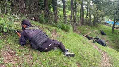 Security personnel during an ongoing encounter between security forces and terrorists in a forest area at Akhal, in Kulgam district, Jammu and Kashmir, (PTI) Security personnel during an ongoing encounter between security forces and terrorists in a forest area at Akhal, in Kulgam district, Jammu and Kashmir, (PTI)