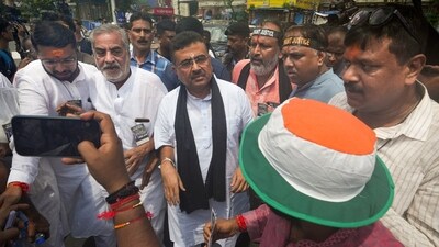 BJP leader Suvendu Adhikari, accompanied by a section of BJP MLAs, meanwhile, joined the victim’s parents at the Dorina Crossing in Esplanade in central Kolkata sans BJP’s banners, flags and other party insignia.&nbsp; (PTI)