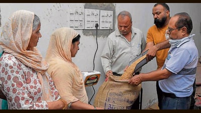 With the free wheat distribution for the July–September quarter already underway, depot holders say they are being forced to bear operational costs from their own pockets. (HT Photo) With the free wheat distribution for the July–September quarter already underway, depot holders say they are being forced to bear operational costs from their own pockets. (HT Photo)