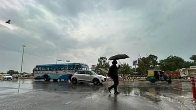 Visuals from Delhi's Rajiv chowk area showed dark skies looming over as people walked with umbrellas. (Parveen Kumar/Hindustan Times) Visuals from Delhi's Rajiv chowk area showed dark skies looming over as people walked with umbrellas. (Parveen Kumar/Hindustan Times)