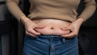 Belly fat can be a sign of insulin resistance, a condition where your body's cells don't respond effectively to insulin, leading to high blood sugar levels. Here's what you need to know. (Shutterstock) Belly fat can be a sign of insulin resistance, a condition where your body's cells don't respond effectively to insulin, leading to high blood sugar levels. Here's what you need to know. (Shutterstock)