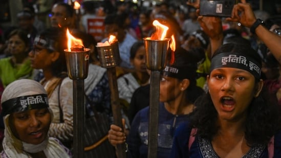 Doctors and citizens participate in a torch rally under the West Bengal Junior Doctors Front (WBJDF) to mark 1 year of the RG Kar student rape - murder incident and demand justice for her in Kolkata.(HT Photo)