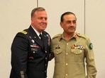 Pakistan Army chief Asim Munir poses for a photograph with former US Central Command Commander General Michael Kurilla.