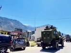 Security personnel patrol the area after an encounter broke out between terrorists and security forces in Kishtwar on Sunday. (PTI)
