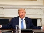 Donald Trump earlier had Barack Obama's portrait moved across the White House foyer to make space for his photo from when he survived the assassination attempt in Butler, Pennsylvania. Donald Trump earlier had Barack Obama's portrait moved across the White House foyer to make space for his photo from when he survived the assassination attempt in Butler, Pennsylvania.
