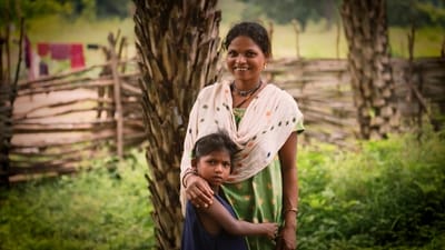 A woman with her child at a Naxal-affected region of Chhattisgarh. (PTI Photo) (PTI) A woman with her child at a Naxal-affected region of Chhattisgarh. (PTI Photo) (PTI)