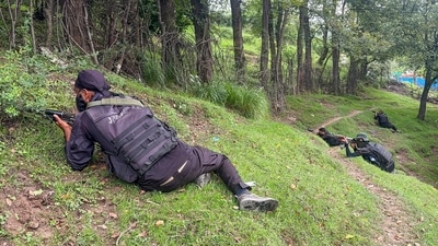 The security forces retaliated, and the gunfight between the two sides continued for quite some time before the terrorists fled deep into the forest. (PTI/ Representational) The security forces retaliated, and the gunfight between the two sides continued for quite some time before the terrorists fled deep into the forest. (PTI/ Representational)