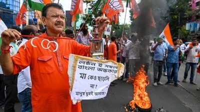 Members of Bharatiya Janata Yuva Morcha (BJYM) protest in Kolkata on Sunday (PTI Photo) (PTI) Members of Bharatiya Janata Yuva Morcha (BJYM) protest in Kolkata on Sunday (PTI Photo) (PTI)