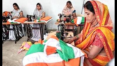 Rural women of an SHG busy stitching National flags at Jasra in Prayagraj (HT Photo) Rural women of an SHG busy stitching National flags at Jasra in Prayagraj (HT Photo)