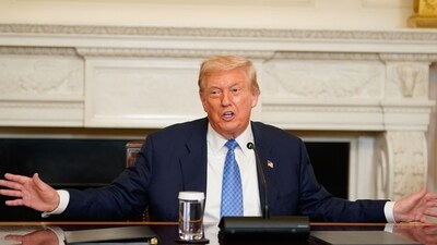 Donald Trump earlier had Barack Obama's portrait moved across the White House foyer to make space for his photo from when he survived the assassination attempt in Butler, Pennsylvania. (Bloomberg)
