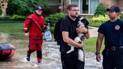 Wisconsin flooding: First responders rescue people from flooding in their homes on August 10, 2025 in Wauwatosa, Wisconsin. Heavy downpours brought as much as 13 inches of rain to parts of southeast Wisconsin overnight, resulting in widespread flooding across the region. (Getty Images via AFP) Wisconsin flooding: First responders rescue people from flooding in their homes on August 10, 2025 in Wauwatosa, Wisconsin. Heavy downpours brought as much as 13 inches of rain to parts of southeast Wisconsin overnight, resulting in widespread flooding across the region. (Getty Images via AFP)